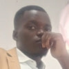 Charles  MBINA