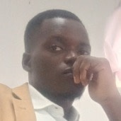 Charles  MBINA