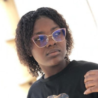 MERITH KOMBO