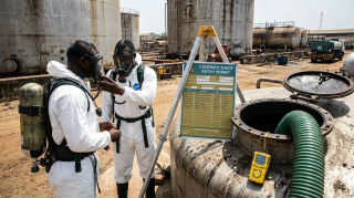 Tank cleaning crew preparing a confined space entry on a hydrocarbon storage tank
